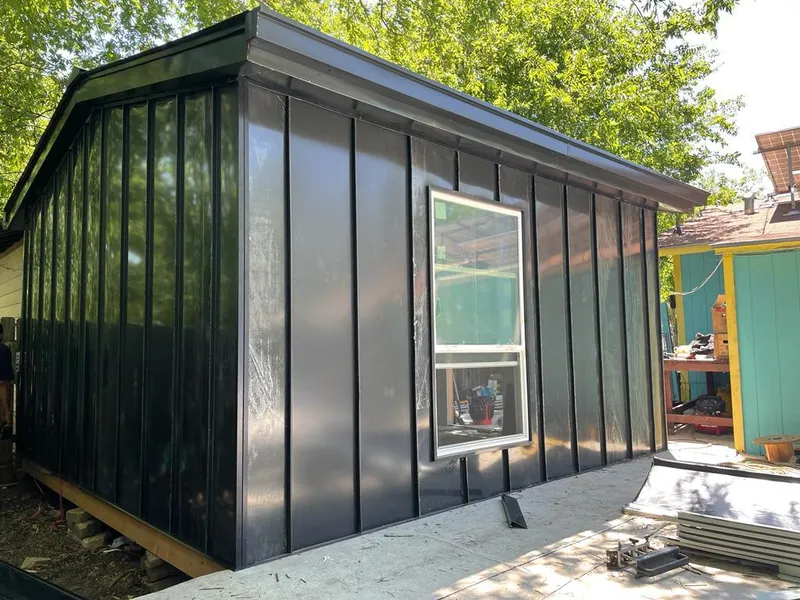 Black standing seam metal wall panels for Metal Roof Installation in East Milton